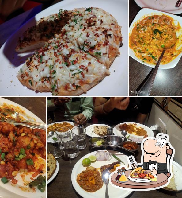 At Laxmi Next Pure Veg Restaurant, you can taste pizza