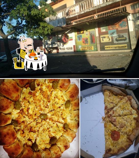 Entre diversos coisas, comida e interior podem ser encontrados no Pizzeria Di Napoli