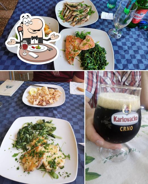 Это снимок, где изображены столики и пиво в Restoran Furia