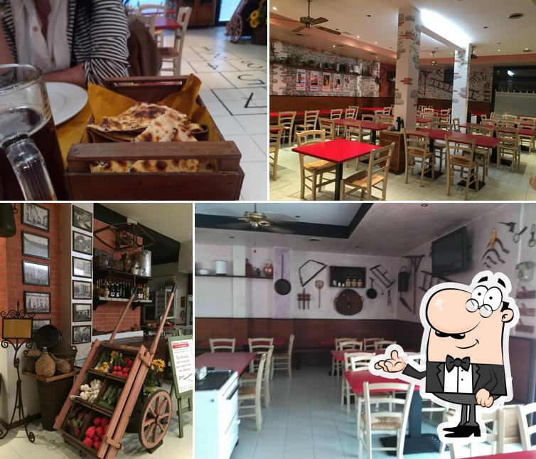 Découvrez l'intérieur de Osteria pizzeria La Campana