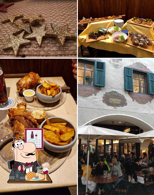 Ordina i piatti di carne a Augustiner in Meran Wirtshaus & Suites