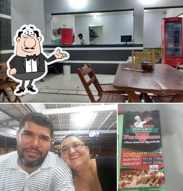 Sente em uma das mesas no Pizzaria Montanha - Liberdade / Boa Vista RR