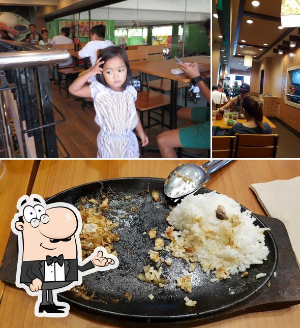 Among various things one can find interior and food at Mang Inasal