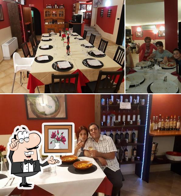 Pizzeria trattoria lucana si caratterizza per la interni e tavolo da pranzo