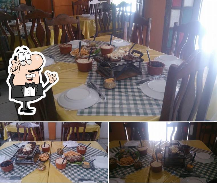 O interior do Restaurante e Pizzaria Caldinho do Nem