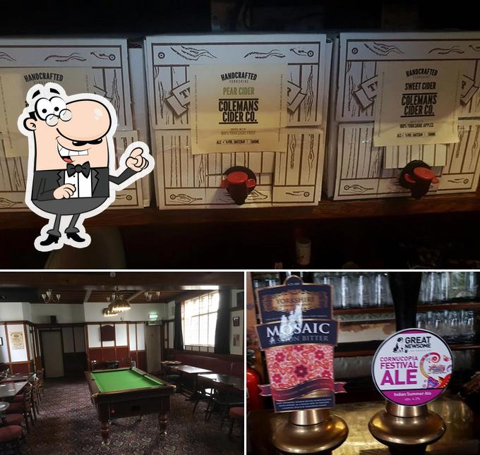 Las fotografías de interior y barra de bar en Station Inn