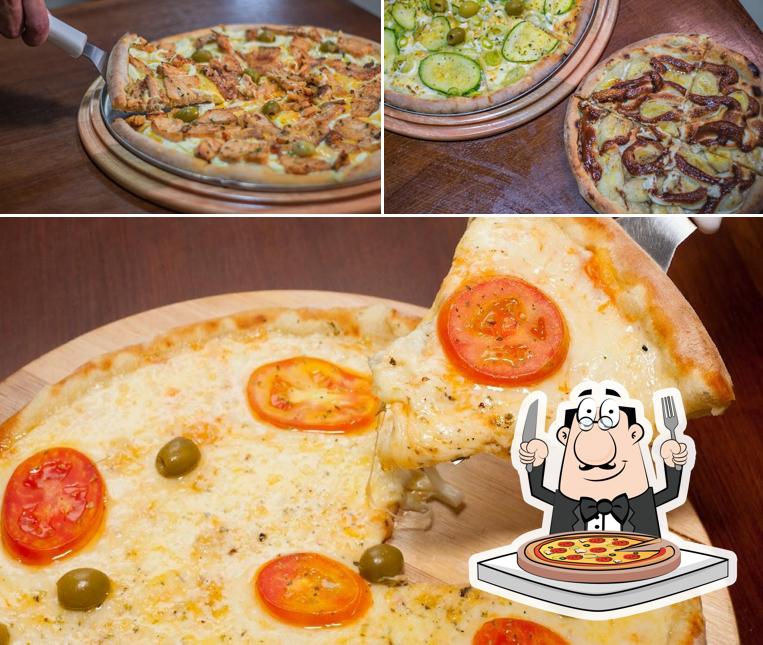 Escolha pizza no Pizzaria Grande Família