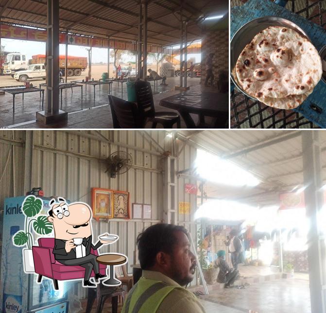 This is the image depicting interior and pizza at Shere Punjab Hotal (PB)
