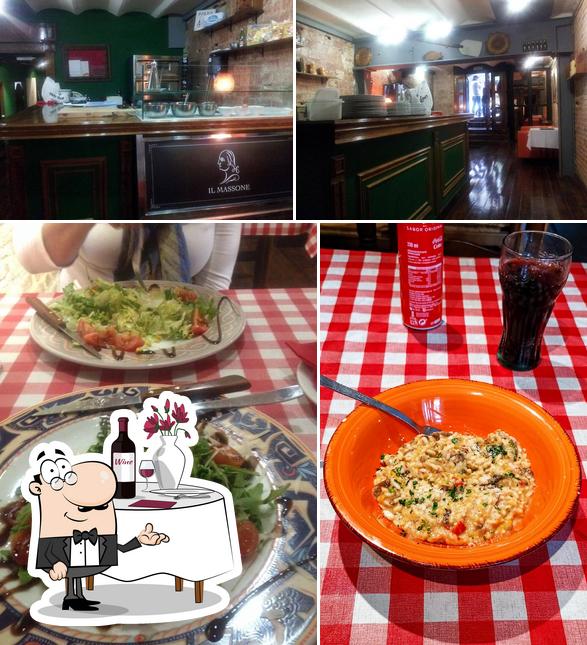 Las imágenes de comedor y barra de bar en Il Massone Ristorante & Pizzeria