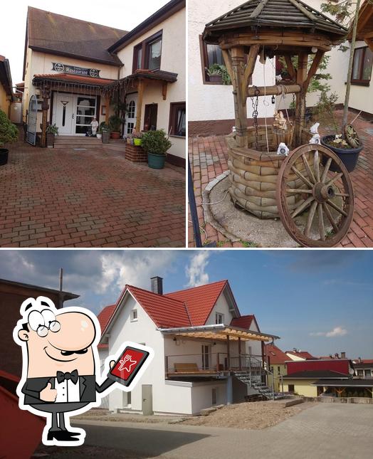 La parte exterior de Gaststätte "Zur Schweiz" mit Bowlingbahn / Pension Thüringen