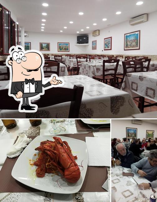 Guarda la immagine che raffigura la interni e frutti di mare di Miramare - Ristorante Pizzeria "da Donato"