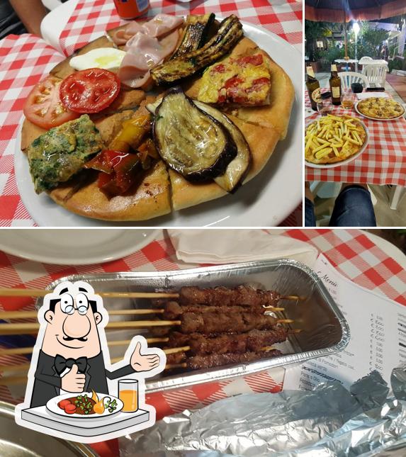 Questa è la foto che presenta la cibo e interni di Peppone arrosticini