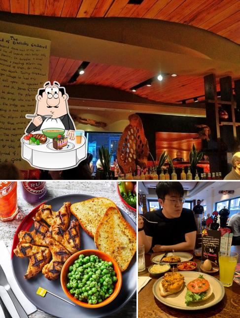 Las fotografías de comedor y barra de bar en Nando's Borehamwood