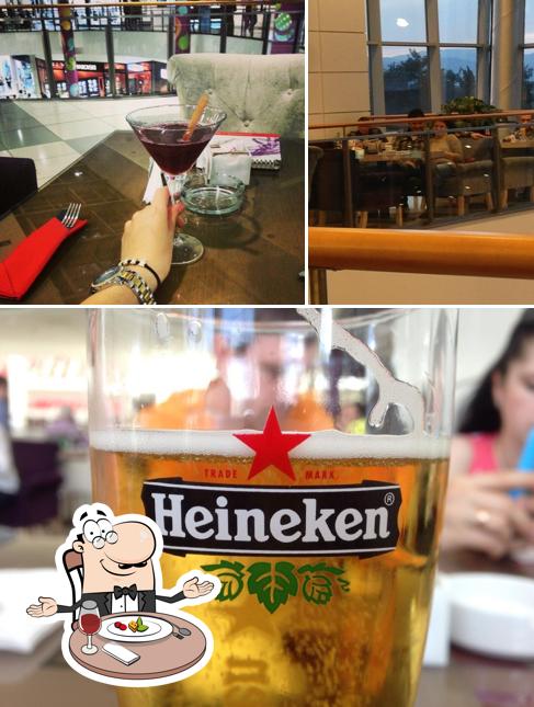 Bild von esstisch und bier bei Sport Cafe Podgorica