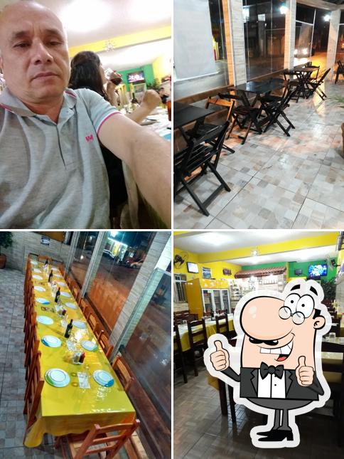 Look at the photo of Pizzaria Mundial