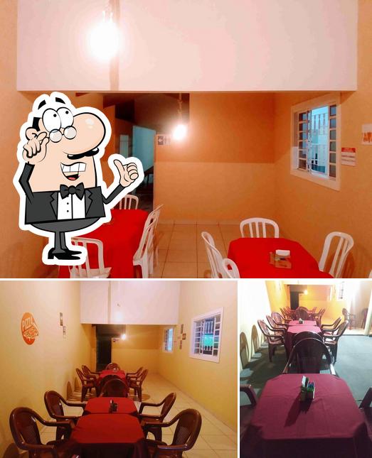 O interior do Vilela Pizzaria Delivery