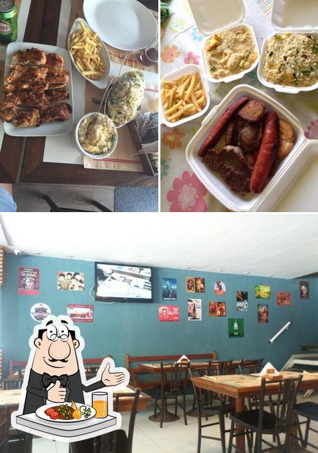 Dê uma olhada a foto apresentando comida e interior a Galeteria Carioca