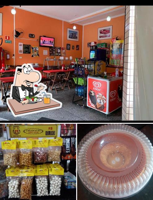 Confira a foto ilustrando comida e interior no Restaurante Aconchego