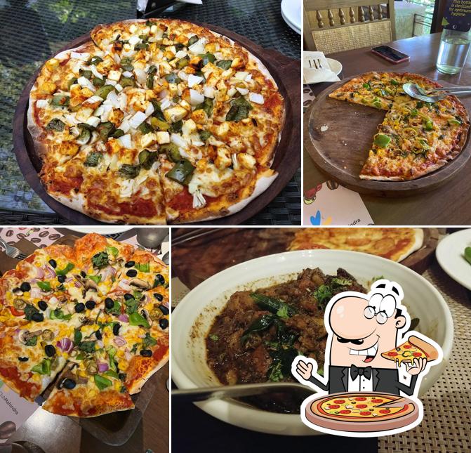 Try out pizza at Coffee Blossom Restaurant