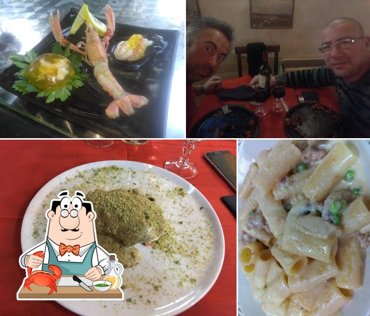 Prenditi tra i molti pasti di mare proposti a Ristorante Pizzeria Griglieria Ponte Vecchio