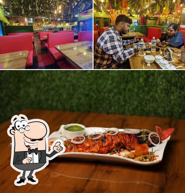 Take a look at the image showing interior and food at Barbecue red fire