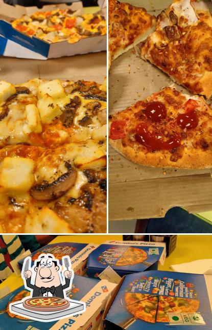 Try out pizza at Domino's Pizza