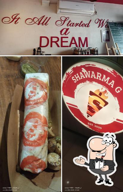 Look at the image of Shawarma G