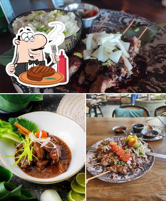 Prueba un plato con carne en Club Bali Restaurant