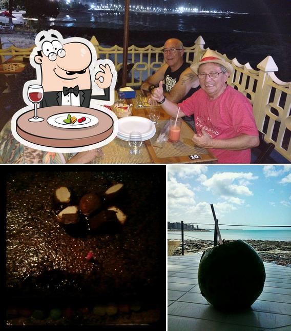 A imagem da comida e interior a Barraca do Maradona