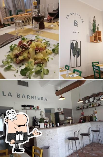 La Barriera Trattoria si caratterizza per la interni e vino