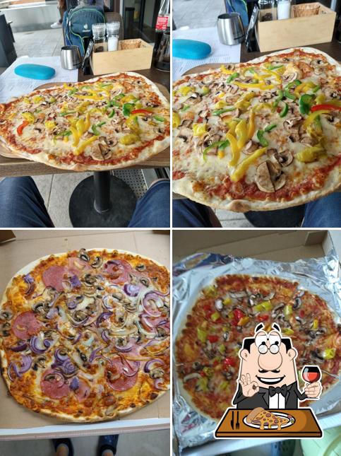 Essayez des pizzas à UFER Essen & Trinken