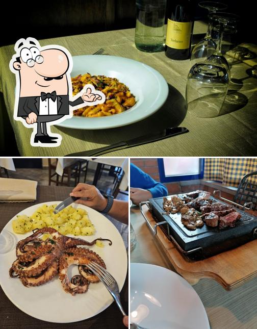 Questa è la immagine che presenta la interni e cibo di Ristorante Pizzeria Via Veneto