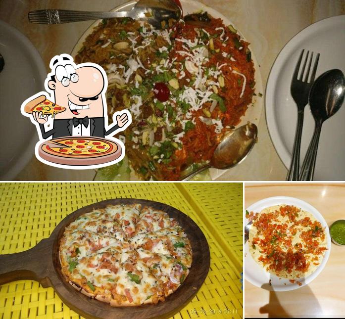 Pick pizza at Sahara Sagar Veg Restaurant