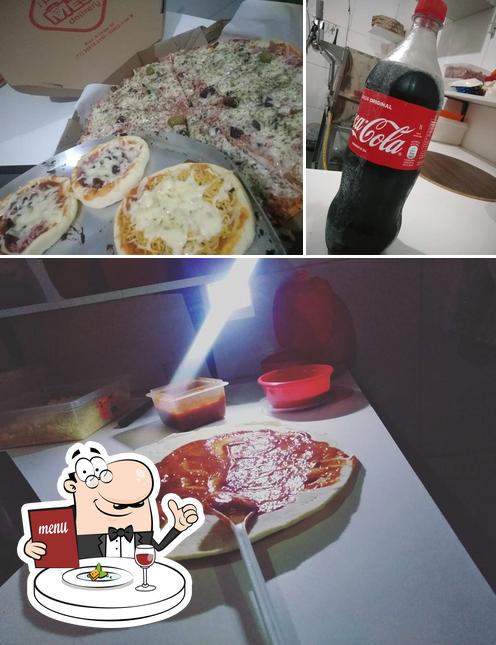 Entre diferentes coisas, comida e bebida podem ser encontrados no Pizzaria Tá na Mesa Delivery