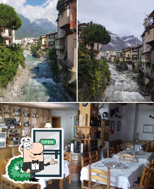 Tra le diverse cose da Trattoria Uomo Selvatico - Chiavenna (so) si possono trovare la esterno e tavolo da pranzo