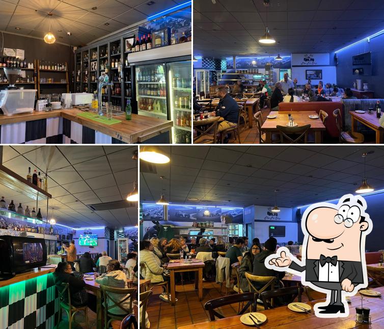 Check out how The Pit Stop Restaurant & Sports Bar looks inside