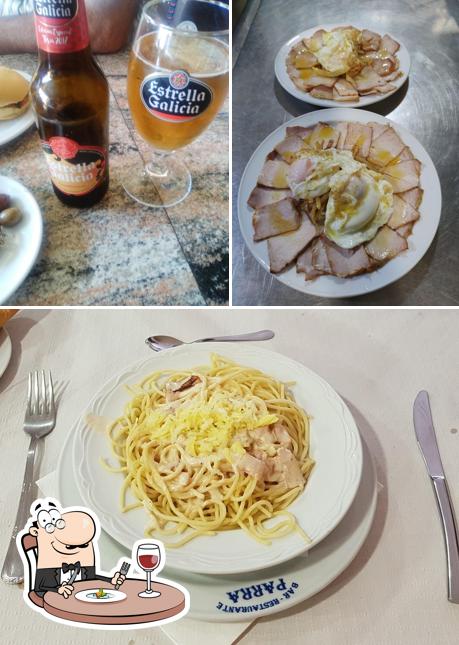 Фотография, на которой видны еда и пиво в Parra Restaurante