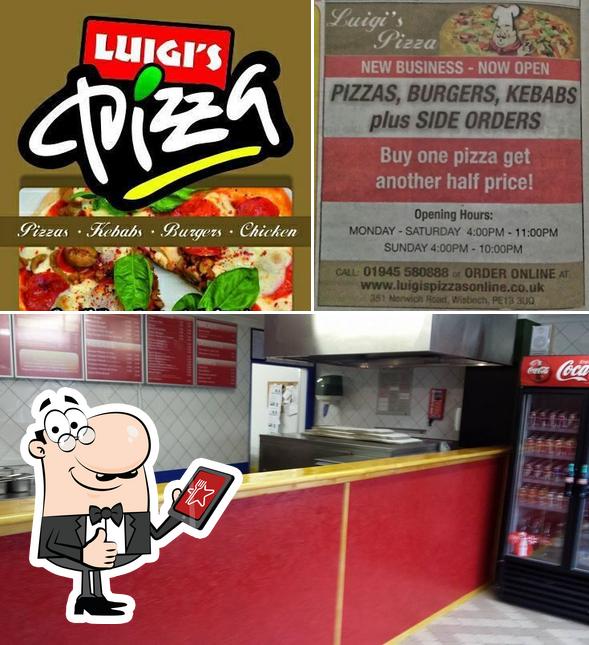 Vea esta foto de Luigis’ Pizza