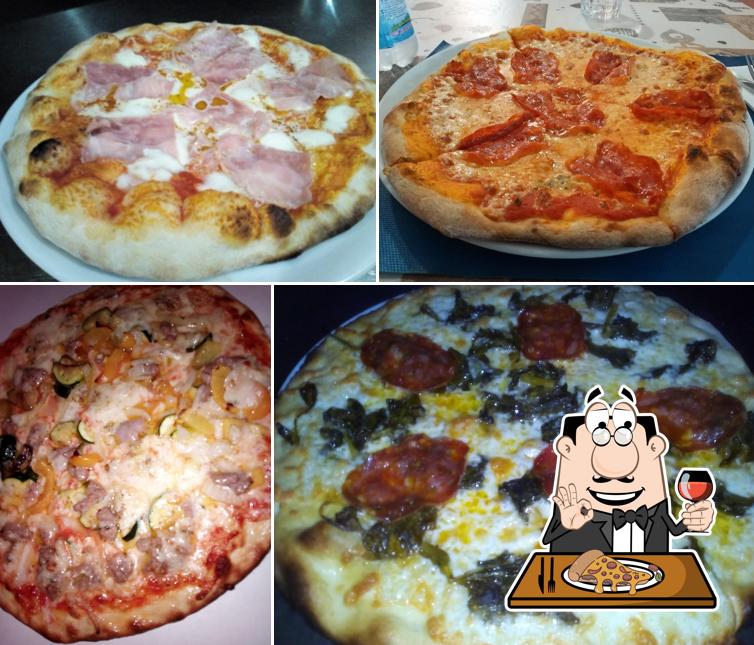 Prenditi una pizza a Pizzeria Bar The Fantasy