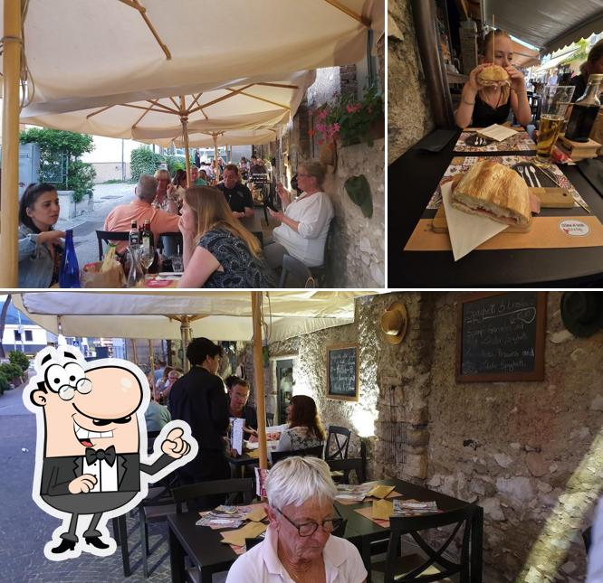 Siediti a un tavolo di 'Osteria Al Vicolo'