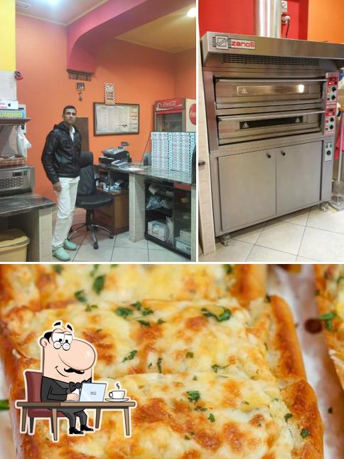 La immagine di interni e pizza da Cheremina 2