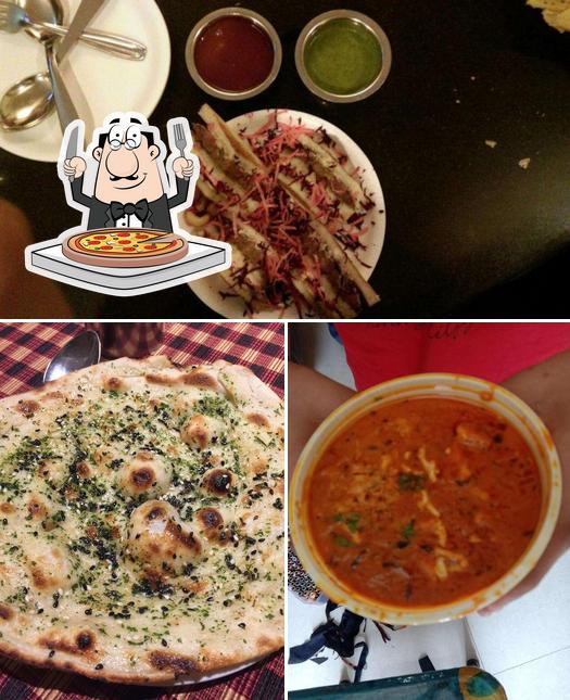 Get pizza at Udupi Tadka Sukhsagar Restaurant