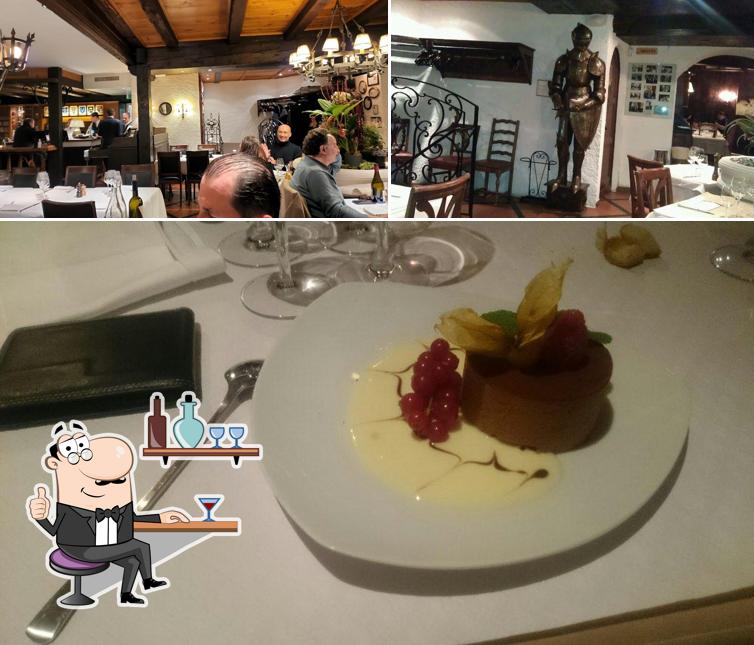 La immagine di interni e cibo da Restaurant Les Armures