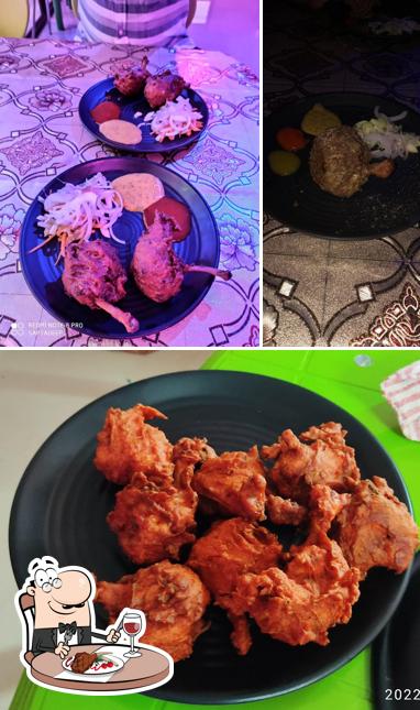 Try out meat dishes at New mother's hut