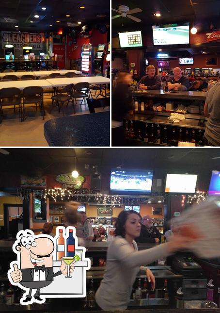 The photo of bar counter and interior at Bleachers Sports Grill