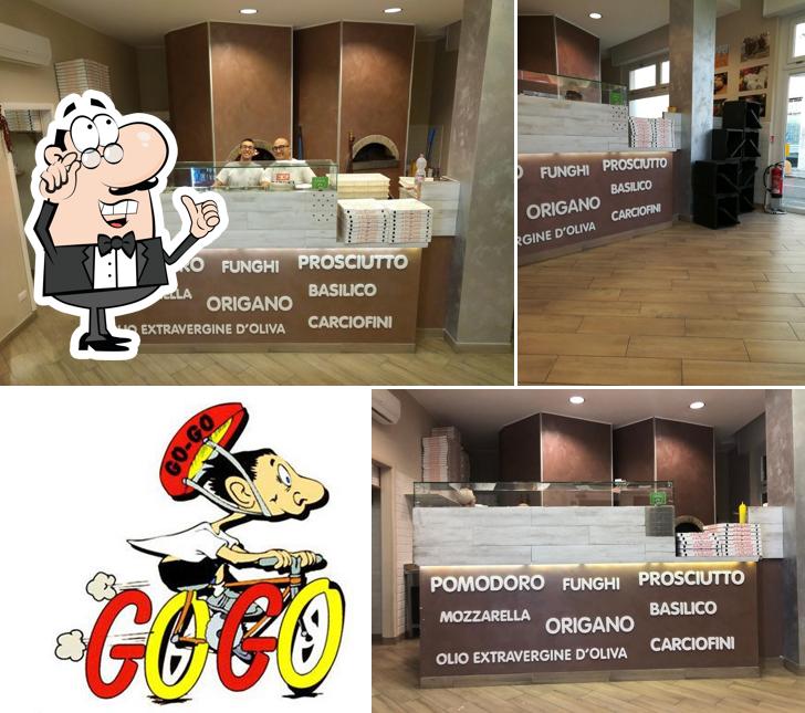 Siediti a un tavolo di Go-go Pizza Pizzeria D'asporto