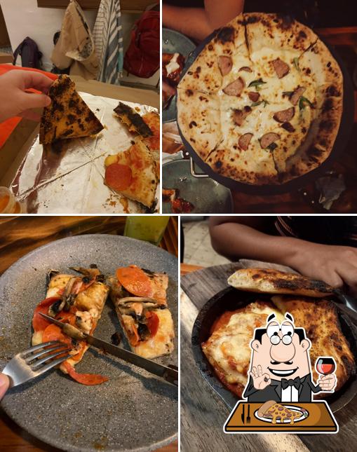 Отведайте пиццу в "Dirosso Pizzería Napolitana"