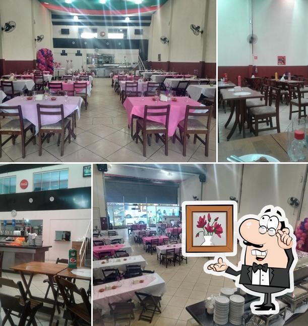 El interior de Robinho Pizzaria e Restaurante