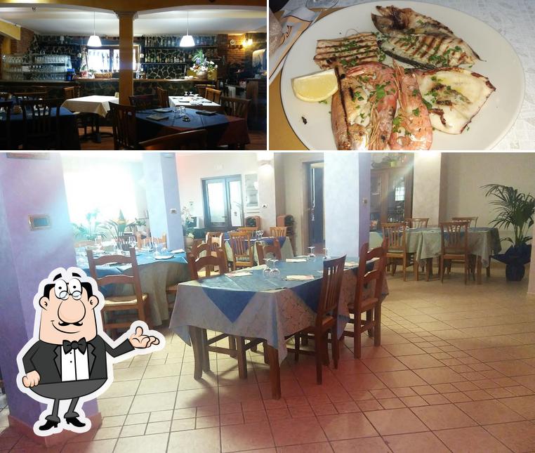 Guarda la foto che raffigura la interni e frutti di mare di Ristorante il pirata