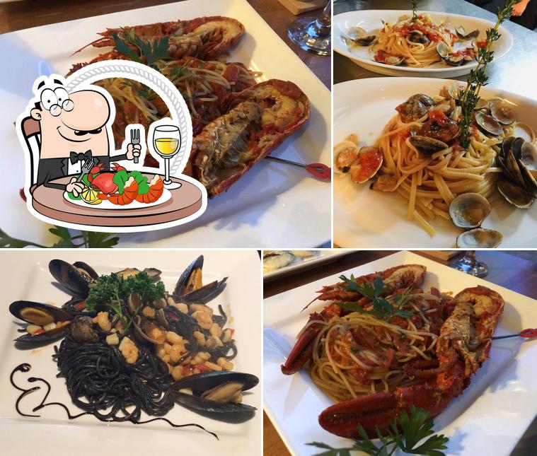 Order different seafood meals served at Giardini di Sorrento
